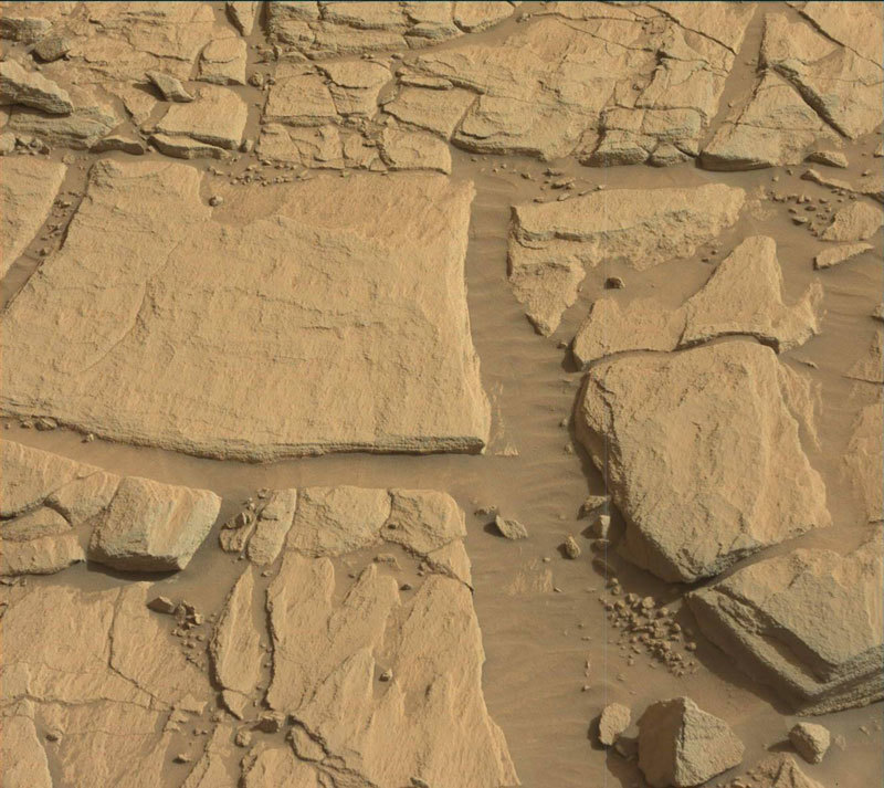 The "Edinburgh" target (trapezoid shaped block, upper left) as viewed from our sol 2700 location.