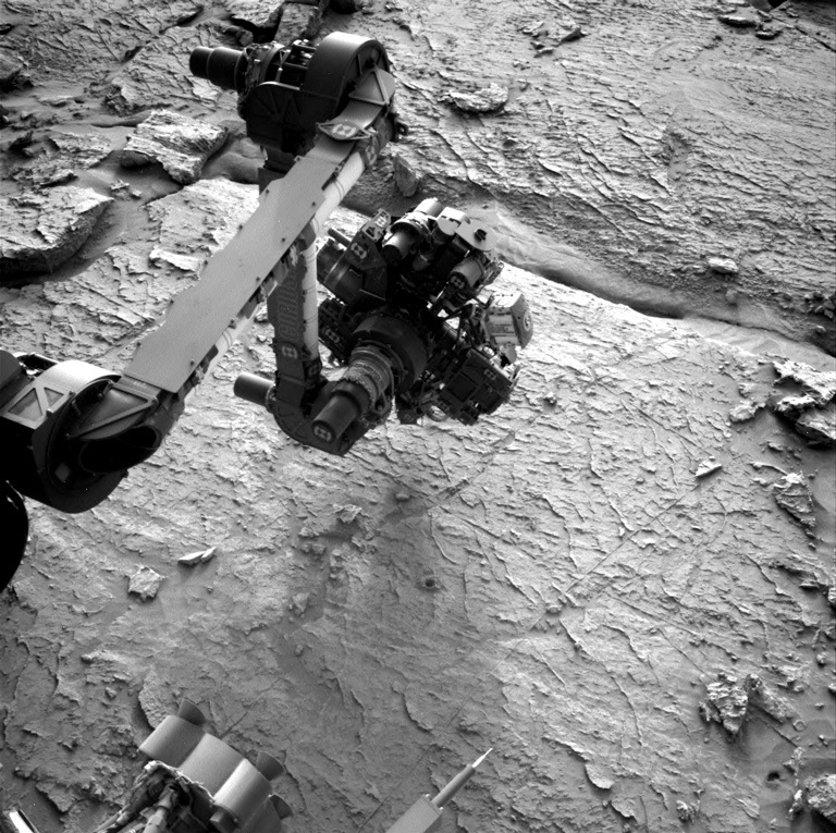 Part of the Curiosity is visible in this image of Mars