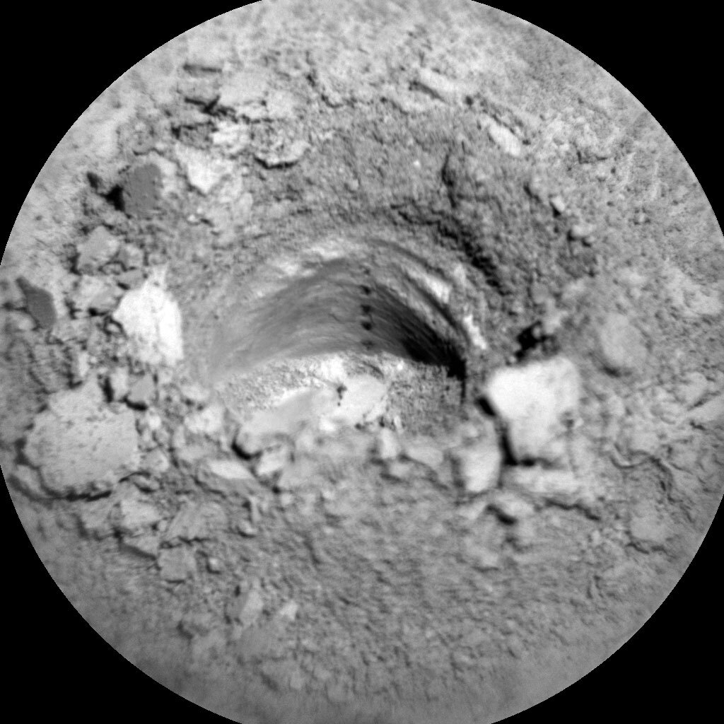 Image of the Zechstein drill hole wall and tailings around the drill hole.