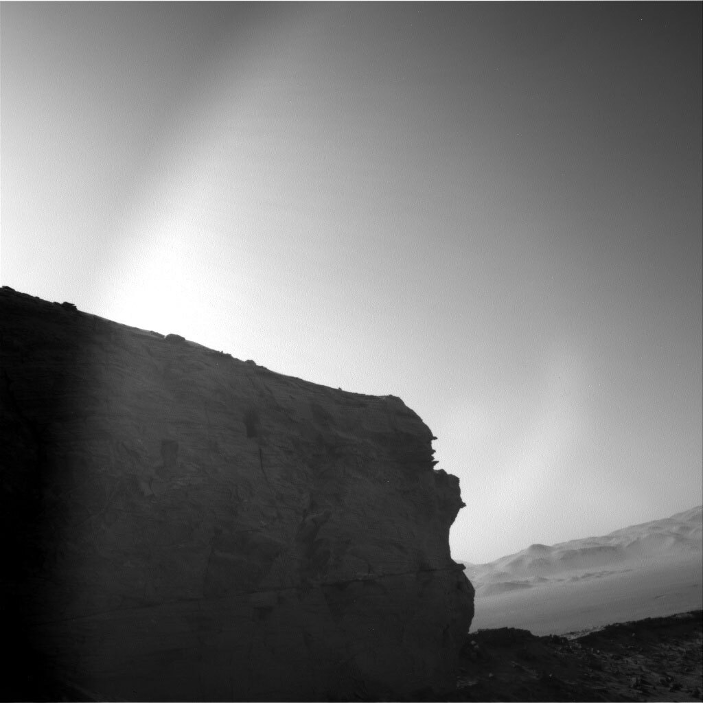 This is a black and white image of the Maria Gordon notch, which is a hill the Curiosity rover has been exploring.  