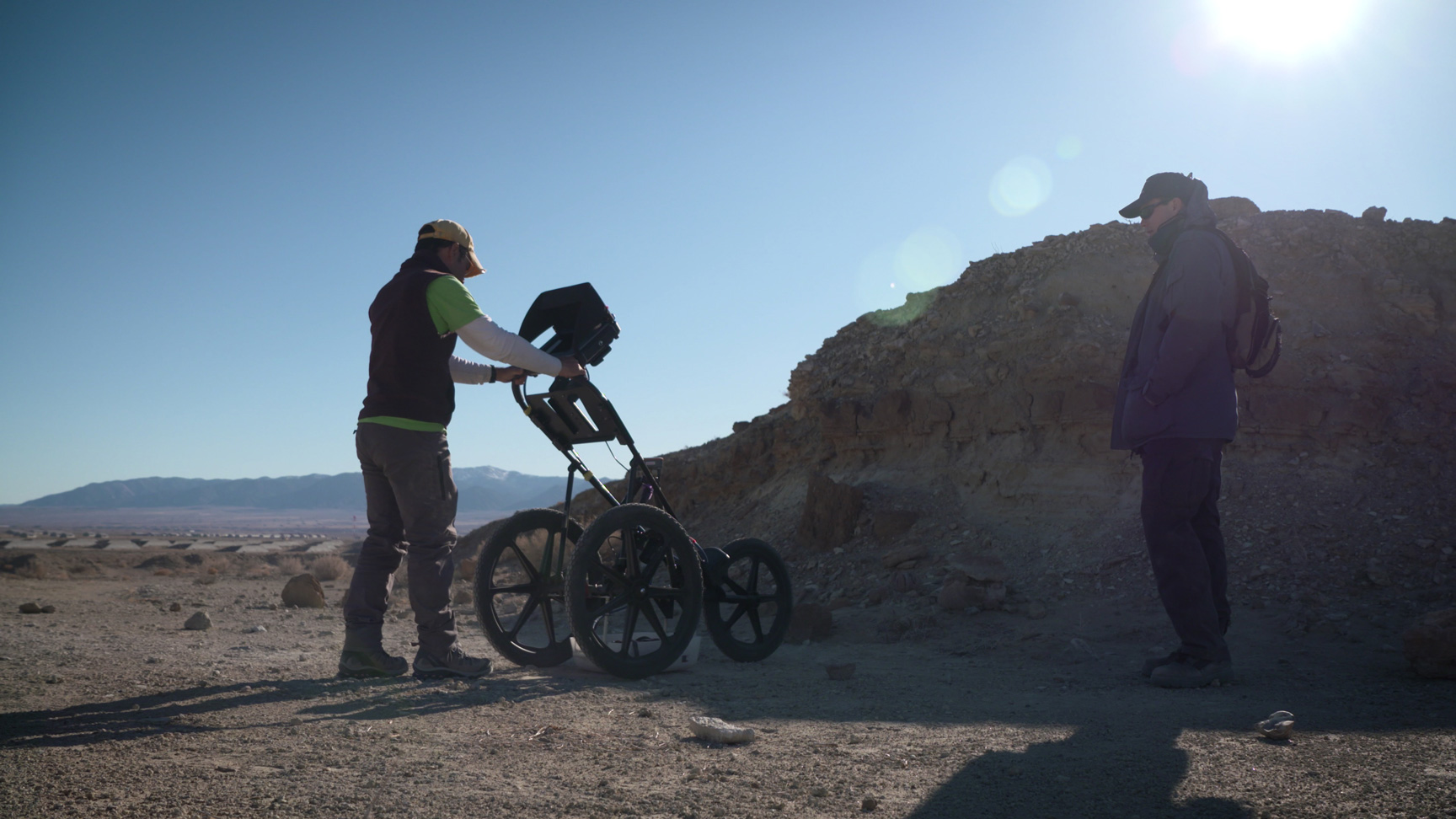 Two scientist preparing for measurements