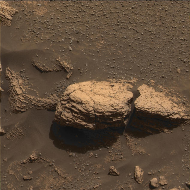 This color image taken by the panoramic camera onboard the Mars Exploration Rover Opportunity shows the part of the rock outcrop dubbed Stone Mountain at Meridiani Planum, Mars.