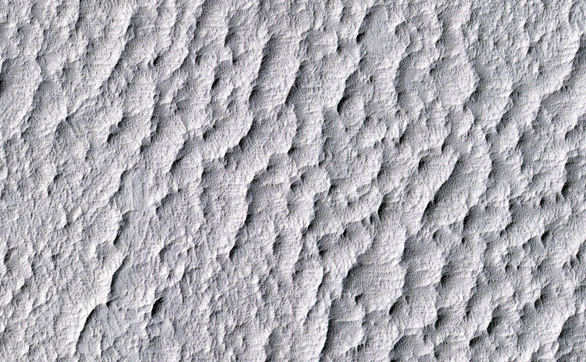 This image from the HiRISE camera on NASA's Mars Reconnaissance Orbiter shows a location associated with the novel and movie, "The Martian." It is the tale's planned landing site for the Ares 4 mission.