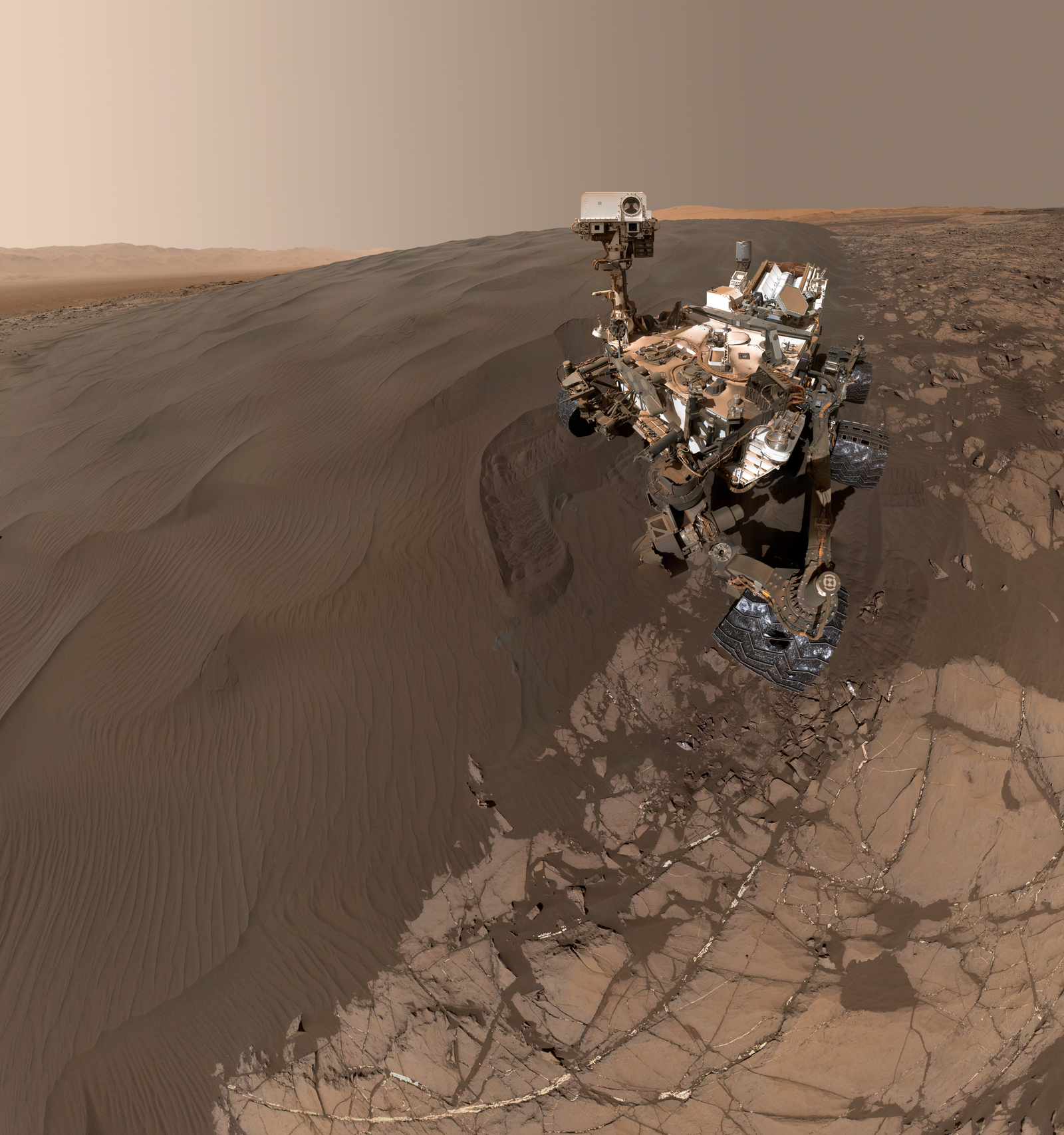 This Jan. 19, 2016, self-portrait of NASA's Curiosity Mars rover shows the vehicle at "Namib Dune," where the rover's activities included scuffing into the dune with a wheel and scooping samples of sand for laboratory analysis.